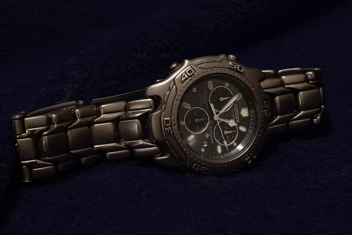 A titanium chronograph on its metal bracelet